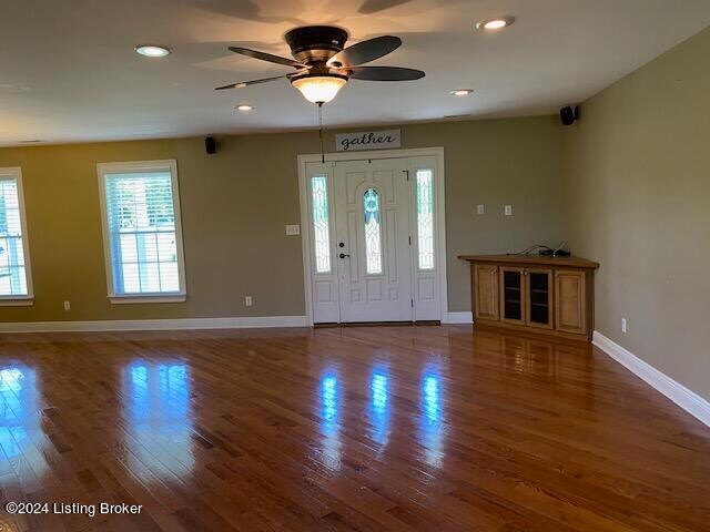 foyer entrance featuring hardwood / wood-style flooring and ceiling fan