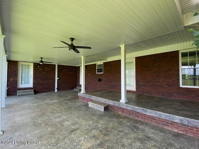 view of patio featuring ceiling fan