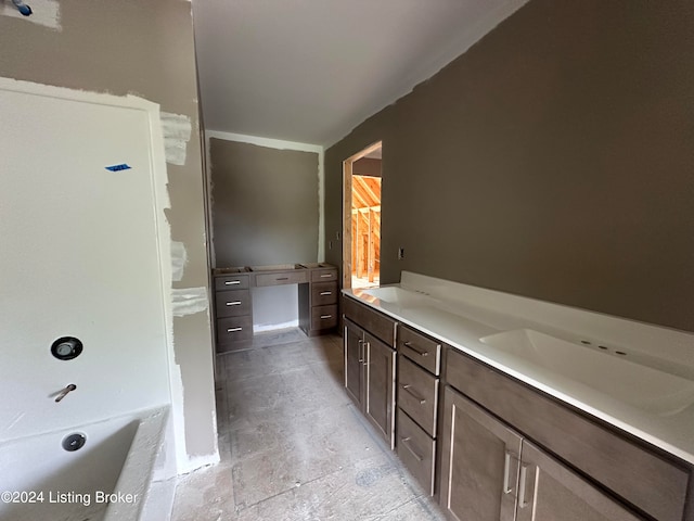 bathroom with vanity and tile patterned flooring