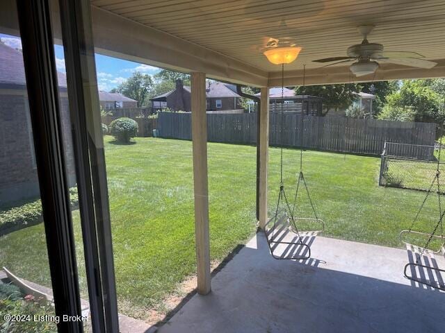 view of patio featuring ceiling fan