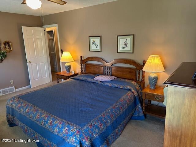 carpeted bedroom featuring ceiling fan