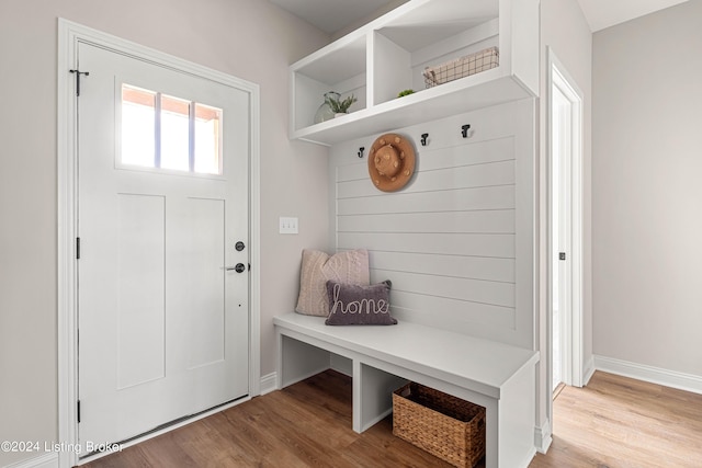 mudroom with light hardwood / wood-style floors