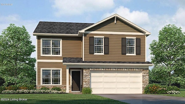 view of front facade with a front yard and a garage