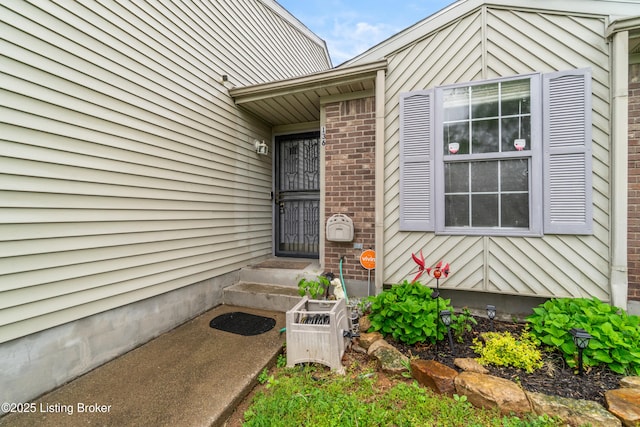 136 Beechtree Ln, Mt Washington, KY 40047 - doorway to property featuring brick siding