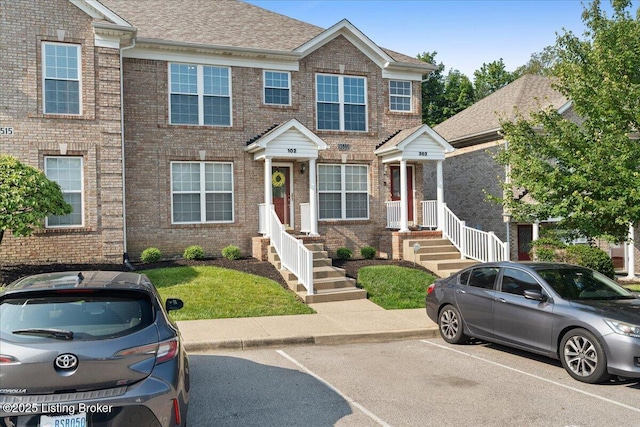 9515 Rustling Tree Way, Louisville, KY 40291 - multi unit property featuring brick siding, uncovered parking, and a shingled roof