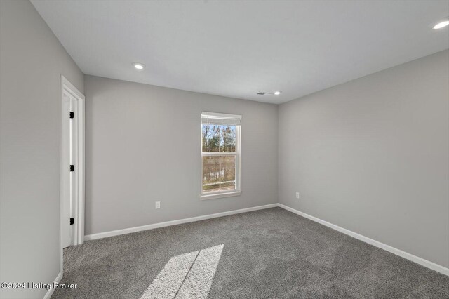 empty room featuring carpet floors