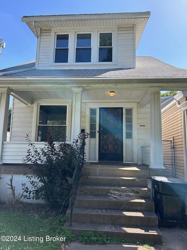 property entrance featuring a porch