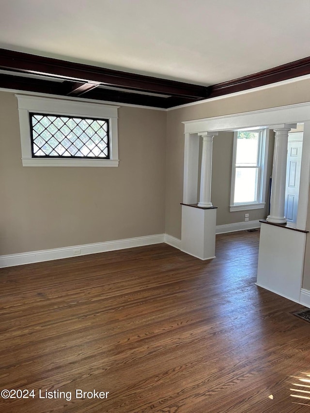 empty room with dark hardwood / wood-style floors