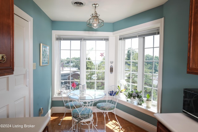 interior space with breakfast area and parquet floors