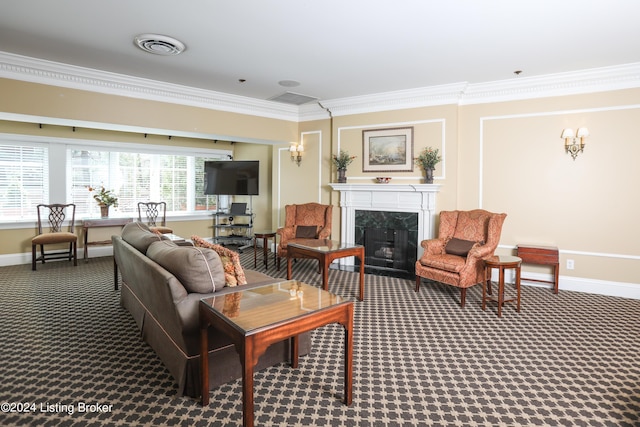 carpeted living room with a premium fireplace and ornamental molding