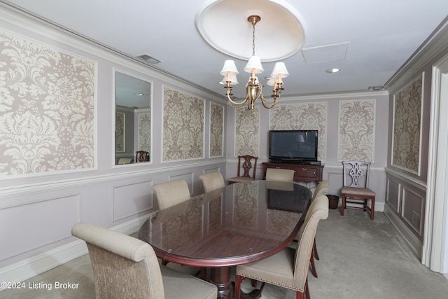 carpeted dining space featuring crown molding and an inviting chandelier