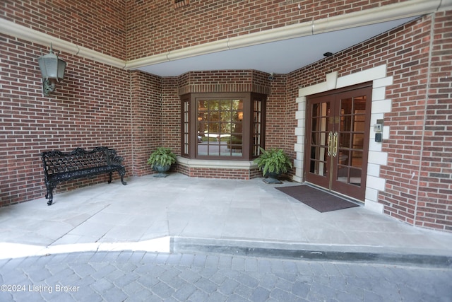 doorway to property featuring french doors