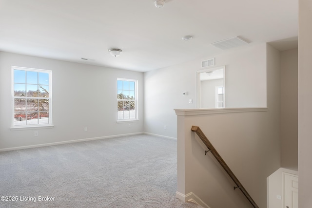 view of carpeted spare room