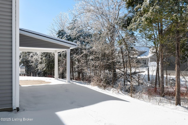 view of snow covered patio