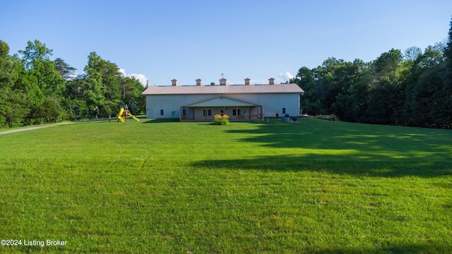 view of yard with a playground