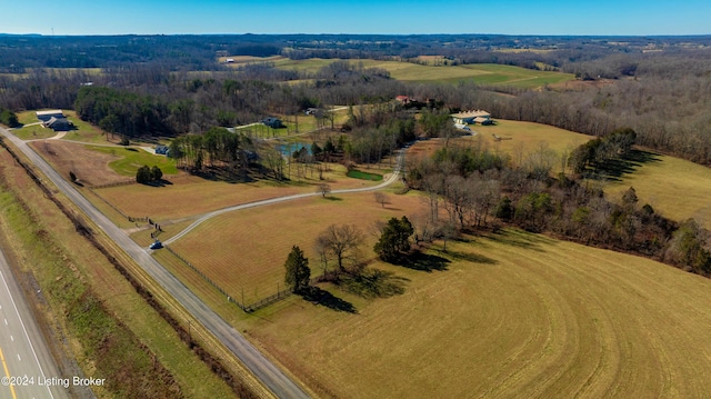 birds eye view of property featuring a rural view