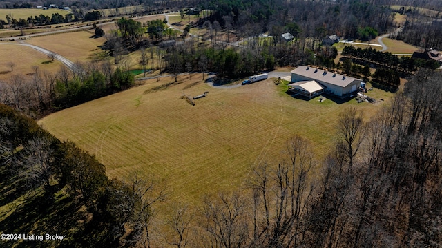 birds eye view of property featuring a rural view