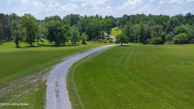 surrounding community featuring a lawn