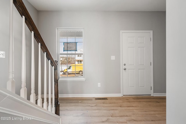 entrance foyer featuring light hardwood / wood-style flooring