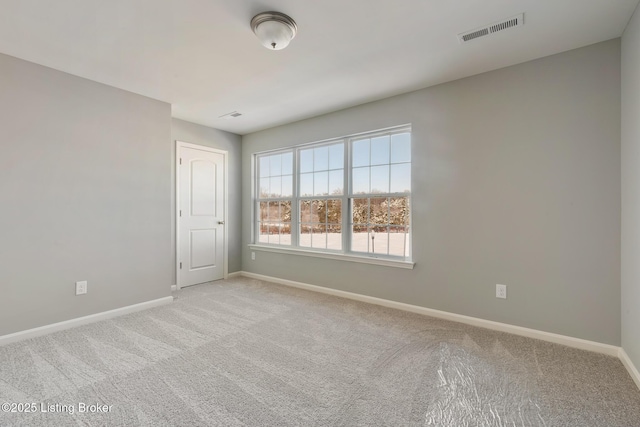 view of carpeted spare room