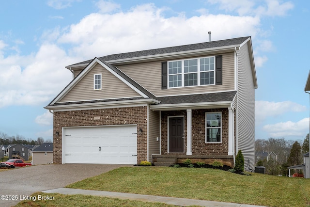 view of front of house with a garage and a front yard