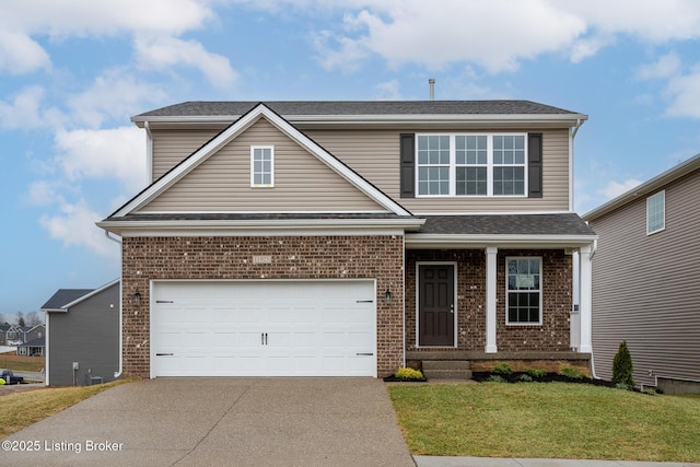 view of front of house featuring a garage and a front lawn