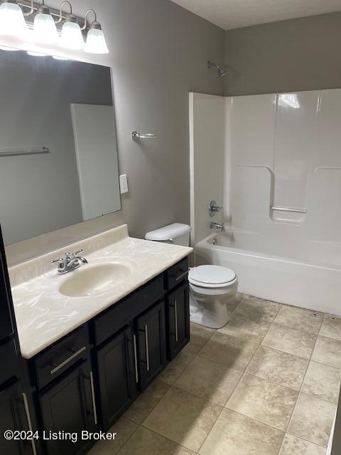 full bathroom featuring vanity, shower / tub combination, and toilet