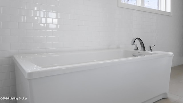 bathroom with tile patterned flooring