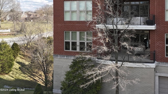 view of property exterior with a balcony