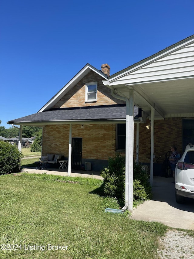 exterior space featuring a yard and a patio