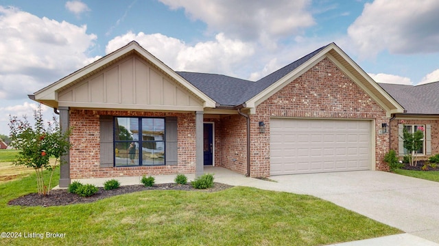 view of front facade featuring a garage and a front lawn