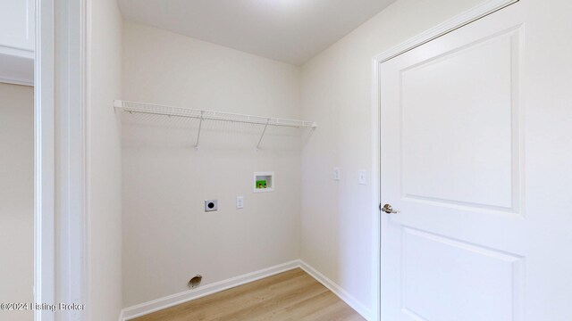 laundry room with hookup for an electric dryer, washer hookup, and light hardwood / wood-style flooring