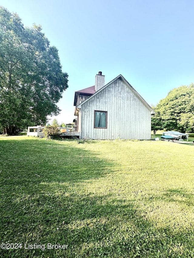 view of home's exterior featuring a lawn