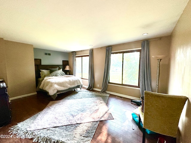 bedroom featuring dark hardwood / wood-style floors