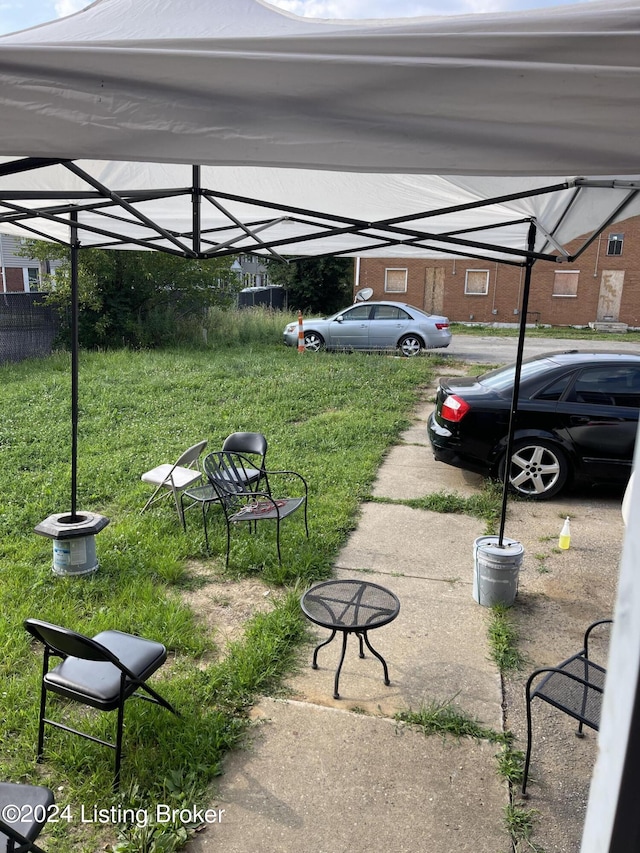 exterior space with a carport