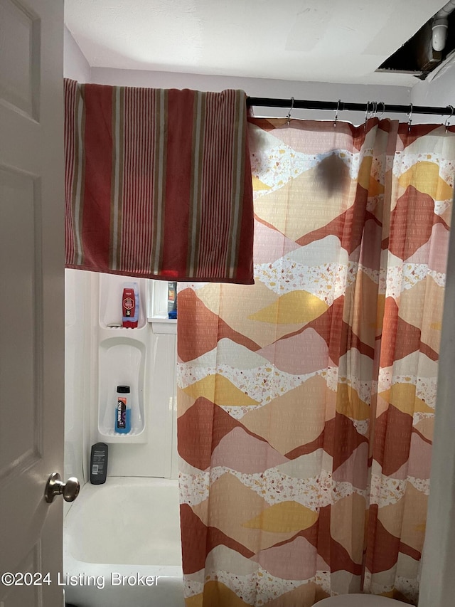 details with shower / bath combination with curtain