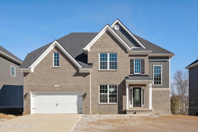 view of front of house with an attached garage, brick siding, a shingled roof, driveway, and board and batten siding