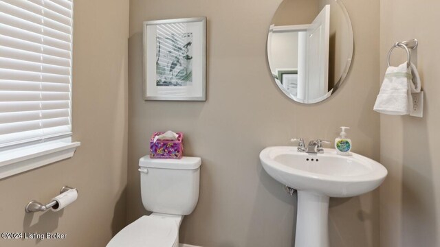 bathroom with sink and toilet