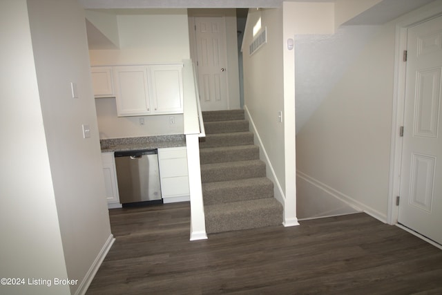 stairway with wood-type flooring