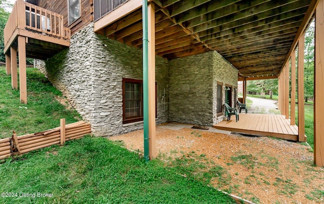 exterior space featuring a wooden deck