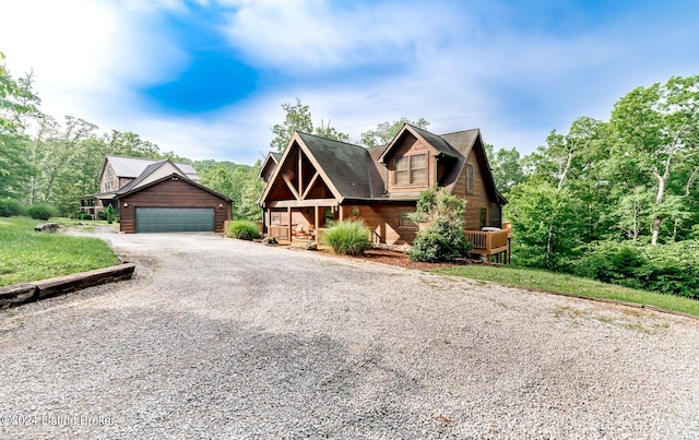 view of front of property featuring a garage and covered porch