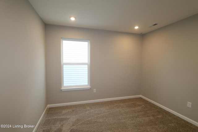 unfurnished room with carpet