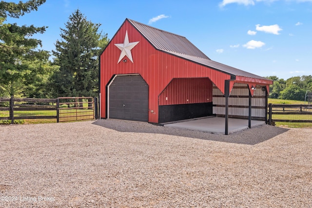 view of outdoor structure featuring a garage