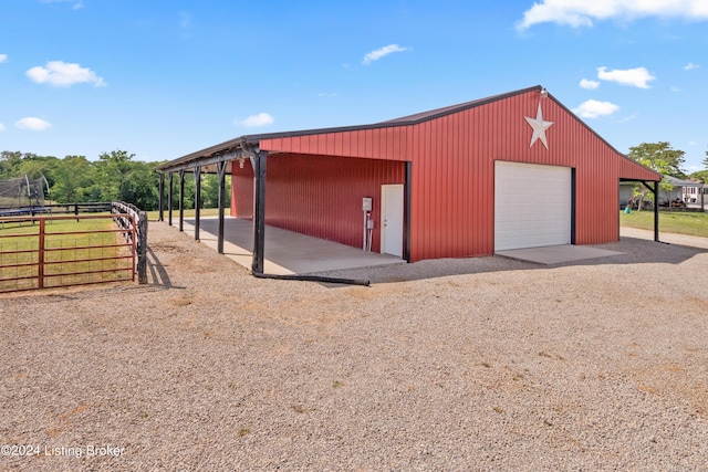 view of outbuilding featuring a garage