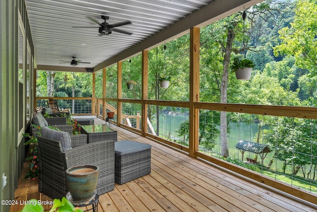 deck featuring ceiling fan and an outdoor hangout area