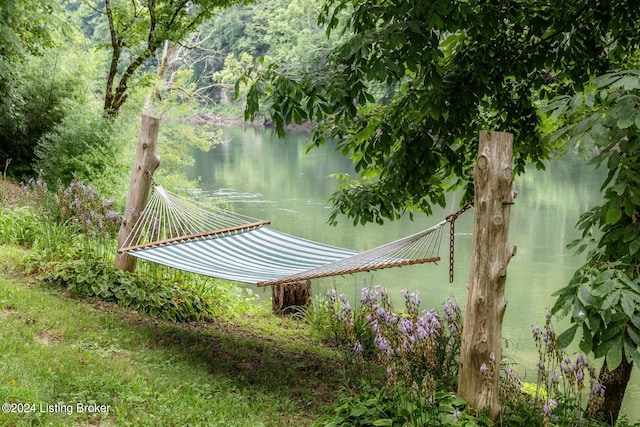 view of community with a water view