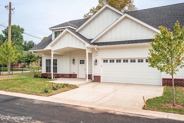 view of front of house featuring brick siding, a shingled roof, concrete driveway, an attached garage, and fence