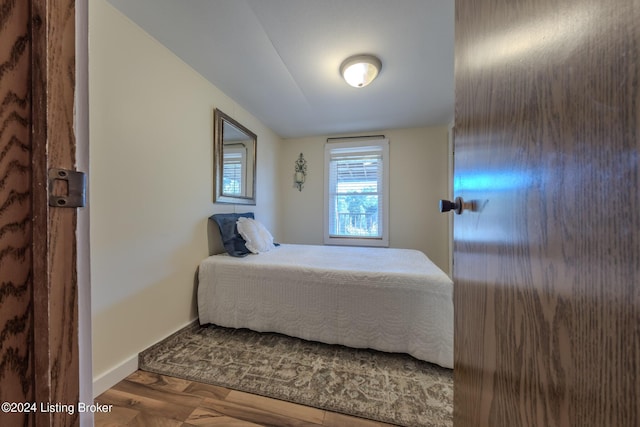 bedroom featuring hardwood / wood-style flooring