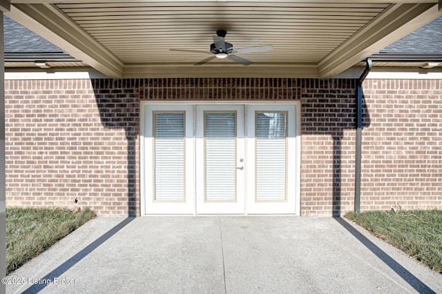 doorway to property with a patio and ceiling fan