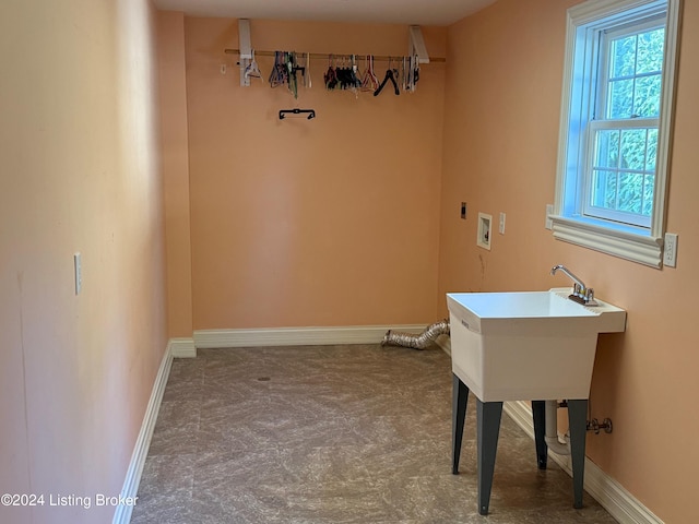 laundry area featuring hookup for an electric dryer, hookup for a washing machine, and carpet